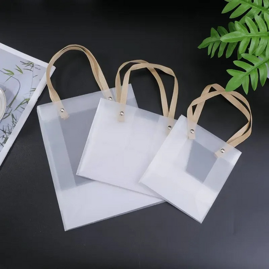 FROSTED LUXE TRANSPARENT GIFT BAGS WITH NATURAL HANDLES