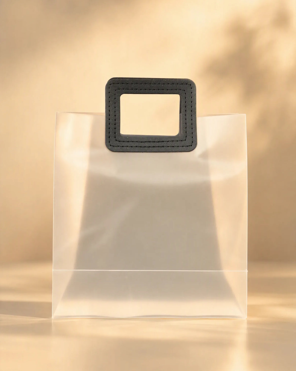 Translucent PVC gift bag with stitched black square carry handle