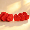Red heart-shaped gift boxes with satin bows, embossed with hearts and 'I love you' text