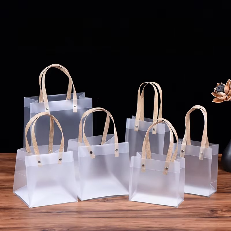 FROSTED LUXE TRANSPARENT GIFT BAGS WITH NATURAL HANDLES