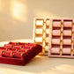 Cream, pink and burgundy velvet bangle display trays with gold-tone roll hardware