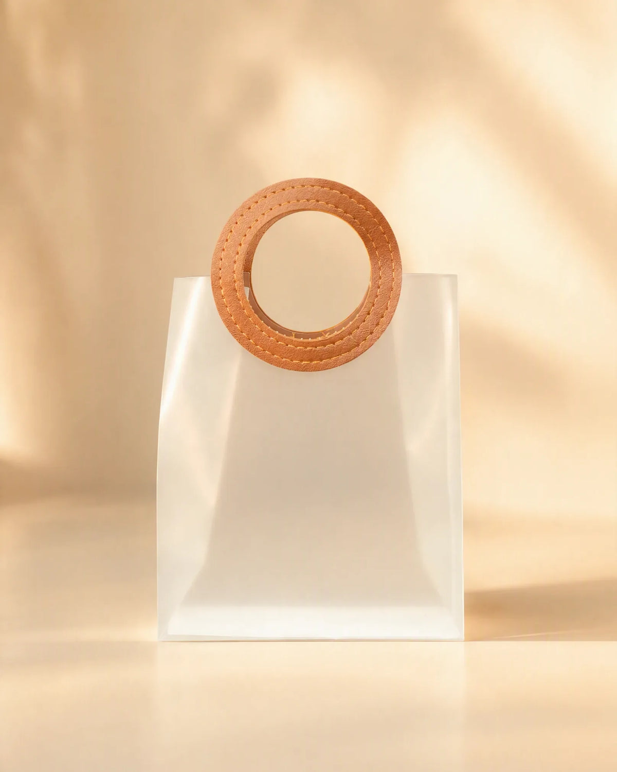 Large frosted PVC gift bag with round brown stitched handle