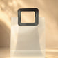Frosted translucent PVC gift bag with black square handle, close on handle