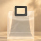 Translucent PVC gift bag with stitched black square carry handle