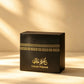 Black Umrah Mubarak gift box with gold geometric border pattern, front view