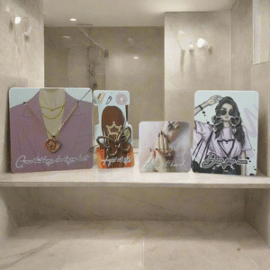 Four card designs featuring jewelry and fashion items on a white background